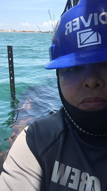 Crew members at water level