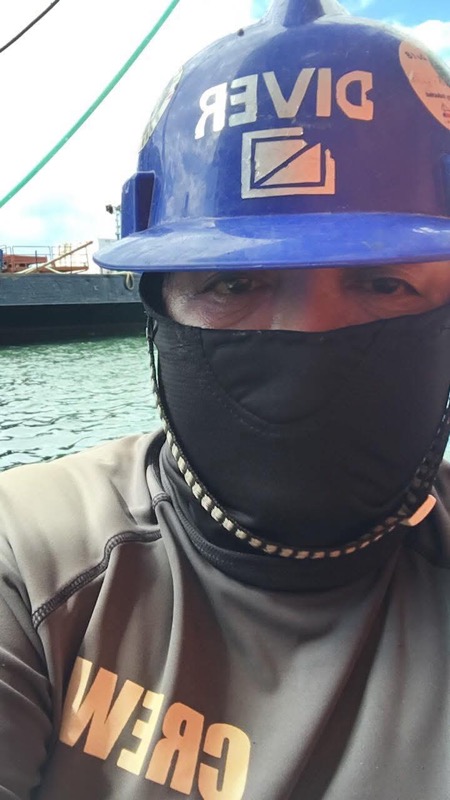 Close-up crew member with DIVER helmet and CREW shirt